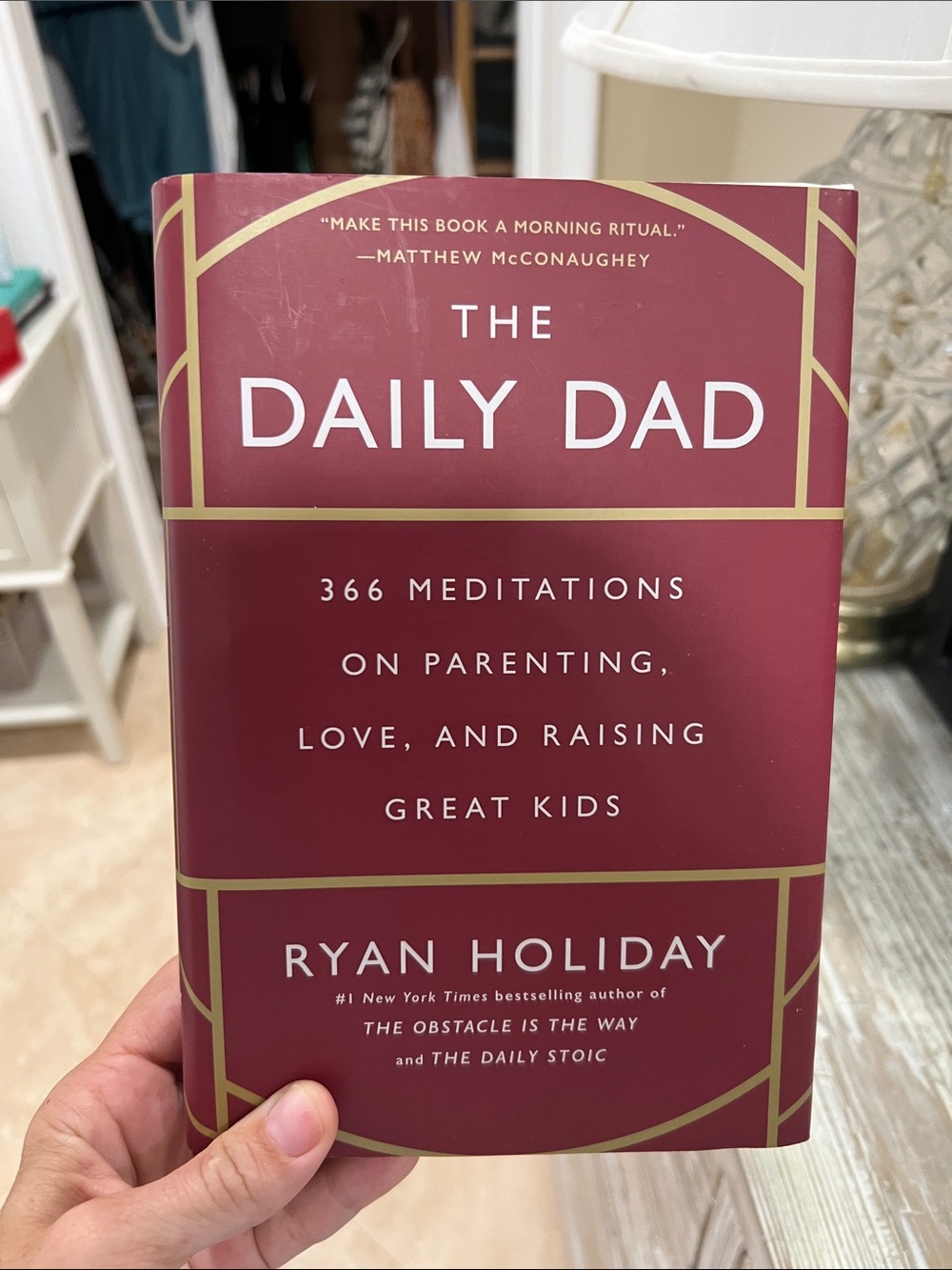 The Daily Dad by Ryan Holiday - Burgundy Hardcover